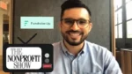 Smiling man on a video call with Fundraise Up and The Nonprofit Show branding visible on the screen.
