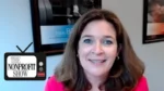 Smiling woman with brown hair on a video call; pink top, with The Nonprofit Show logo in a TV-shaped overlay in the lower-left corner.