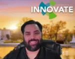 Portrait of a smiling man with a dark beard in front of a sunset background on an INNOVATE magazine cover.